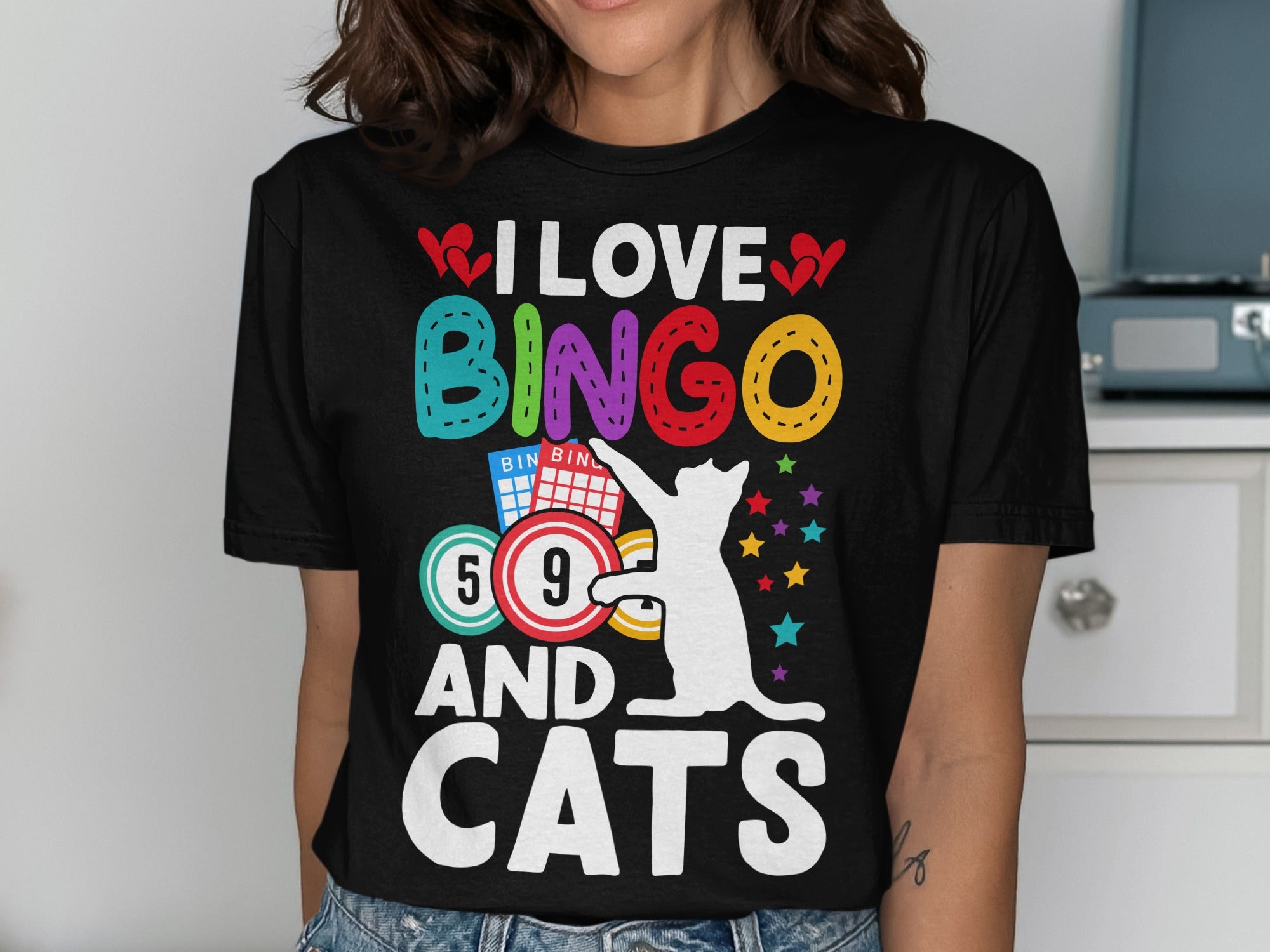 Black t-shirt with "I Love Bingo and Cats" graphic featuring bingo cards, balls, and a cat.