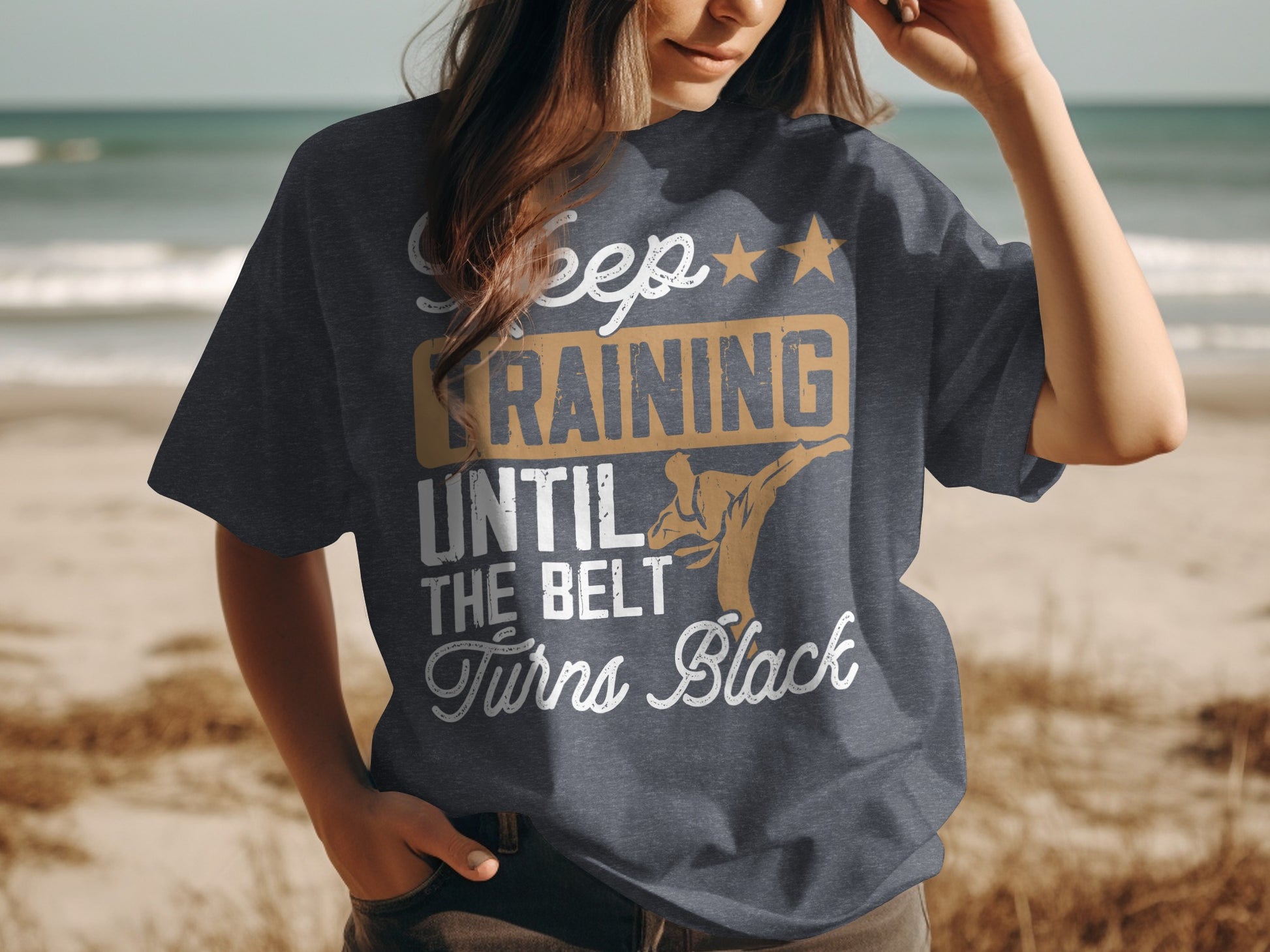 Dark t-shirt with "Keep Training Until The Belt Turns Black" and a karate silhouette.
