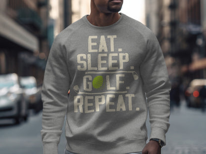 Gray sweatshirt with "Eat. Sleep. Golf. Repeat." text and a golf ball.