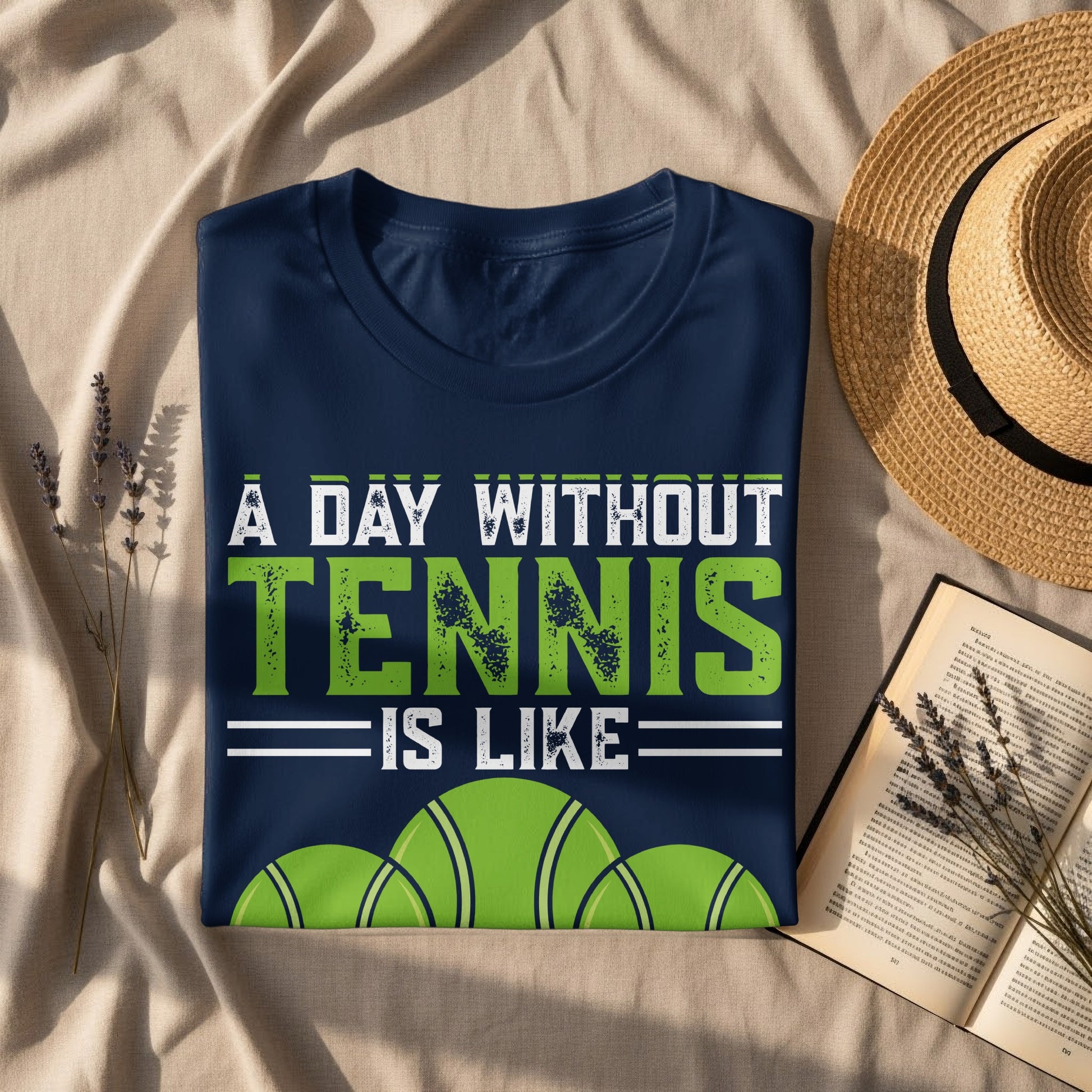 Dark blue t-shirt with "A DAY WITHOUT TENNIS IS LIKE" and tennis balls graphic.