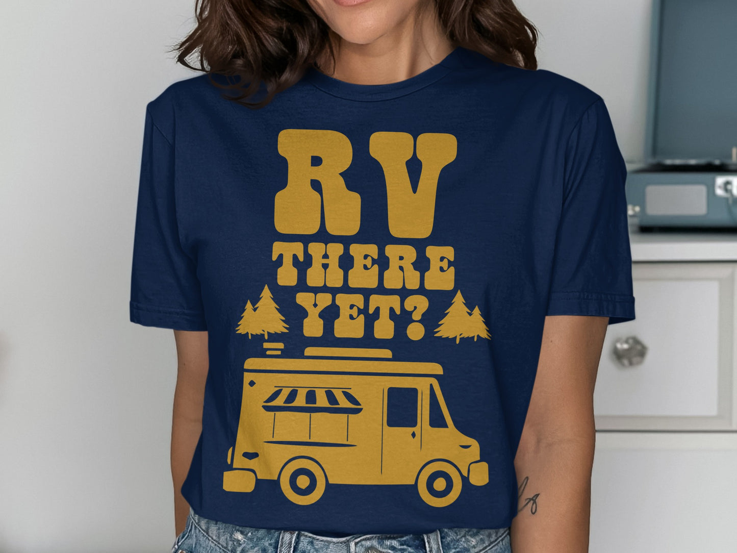 Yellow RV graphic with "RV THERE YET?" text on navy t-shirt.