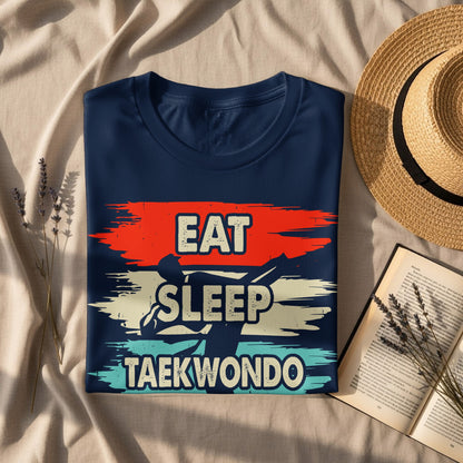 Navy t-shirt with "Eat Sleep Taekwondo" text and graphic.