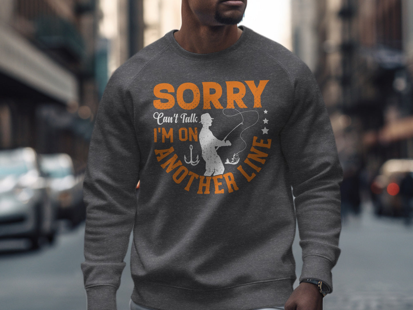 Gray sweatshirt with "SORRY I'M ON ANOTHER LINE" text and fishing graphic.