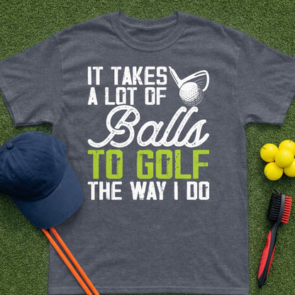 Dark grey t-shirt with "IT TAKES A LOT OF BALLS TO GOLF THE WAY I DO" text.