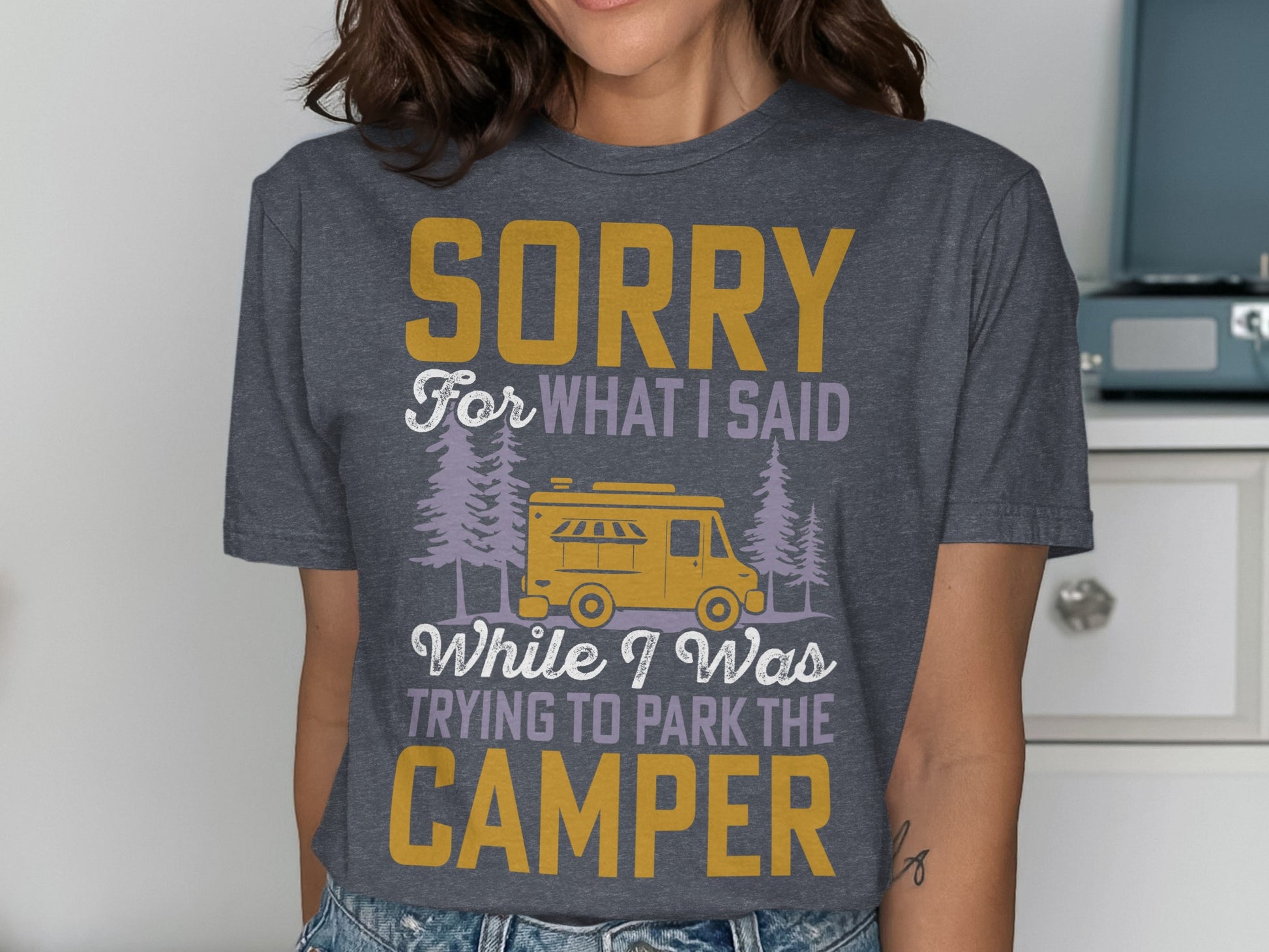 Dark grey t-shirt with text "SORRY FOR WHAT I SAID WHILE I WAS TRYING TO PARK THE CAMPER".