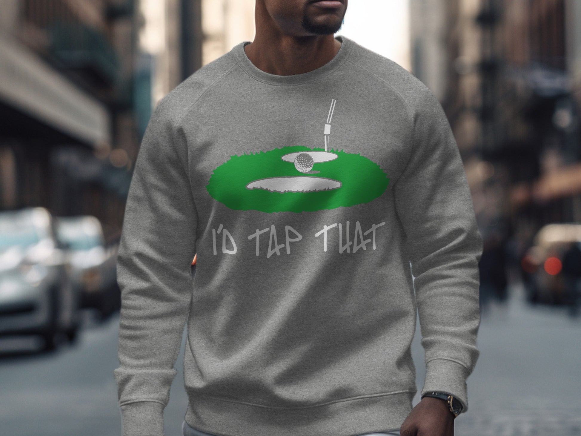Grey sweatshirt with "I'd Tap That" text and a golf green graphic.