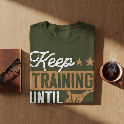 Olive green t-shirt with "Keep TRAINING UNTIL" text and a martial arts silhouette.