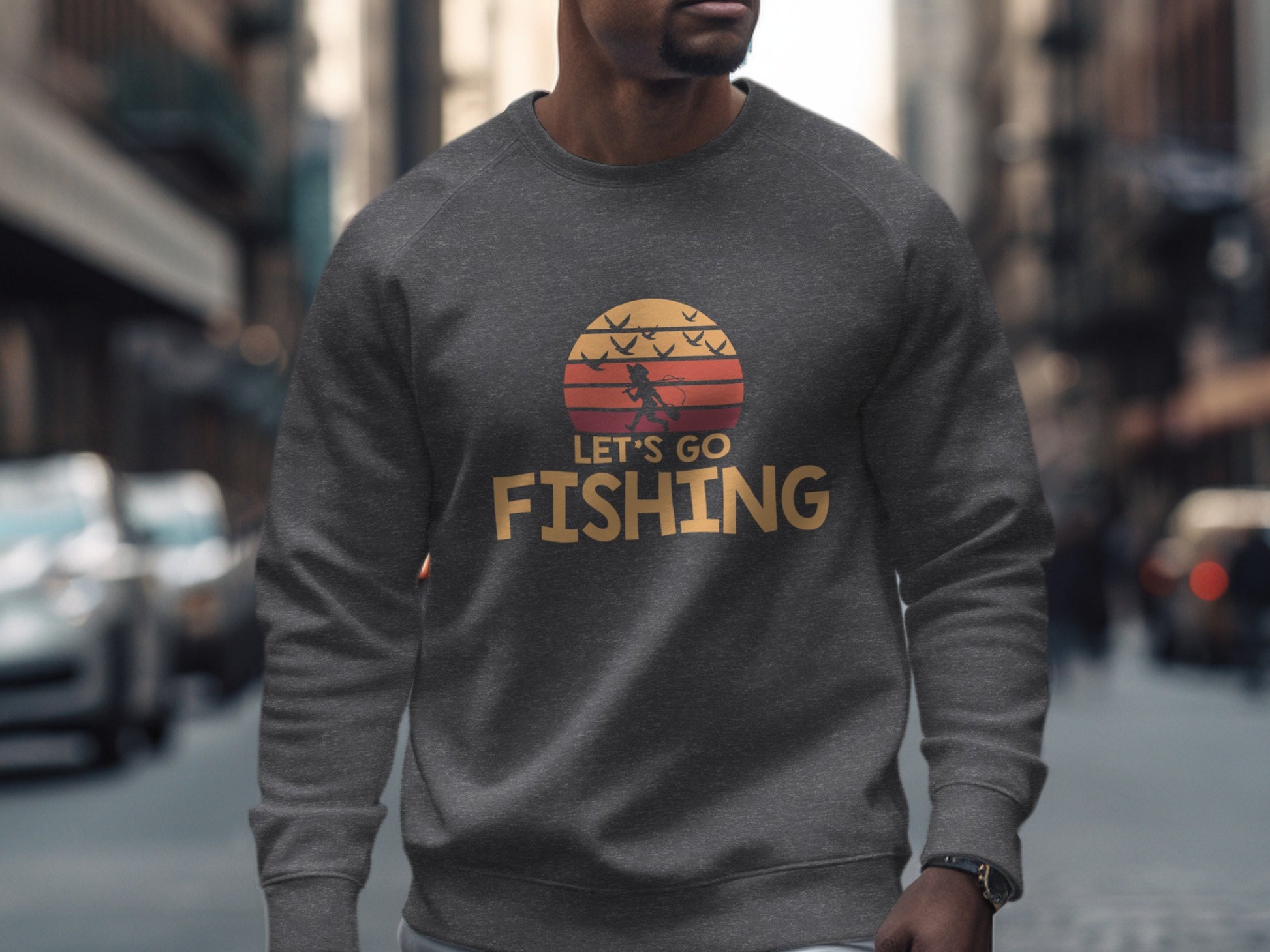 Gray sweatshirt with "Let's Go Fishing" graphic featuring sunset and birds.