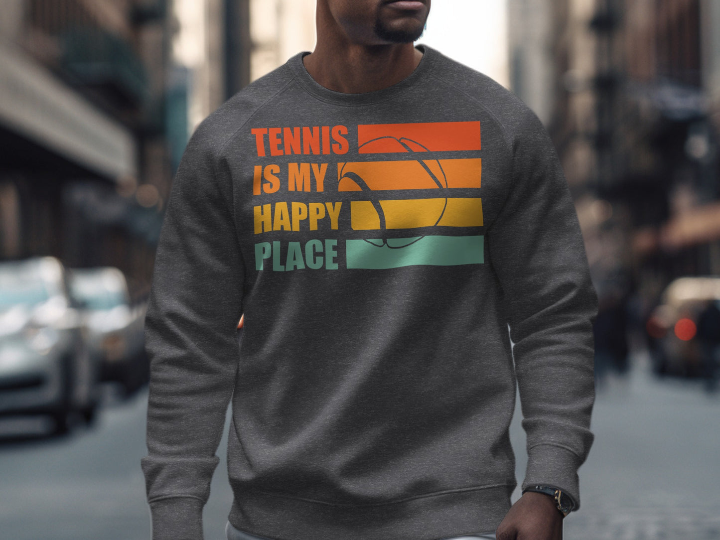 Dark gray sweatshirt with "Tennis is my happy place" text and a stylized tennis ball.
