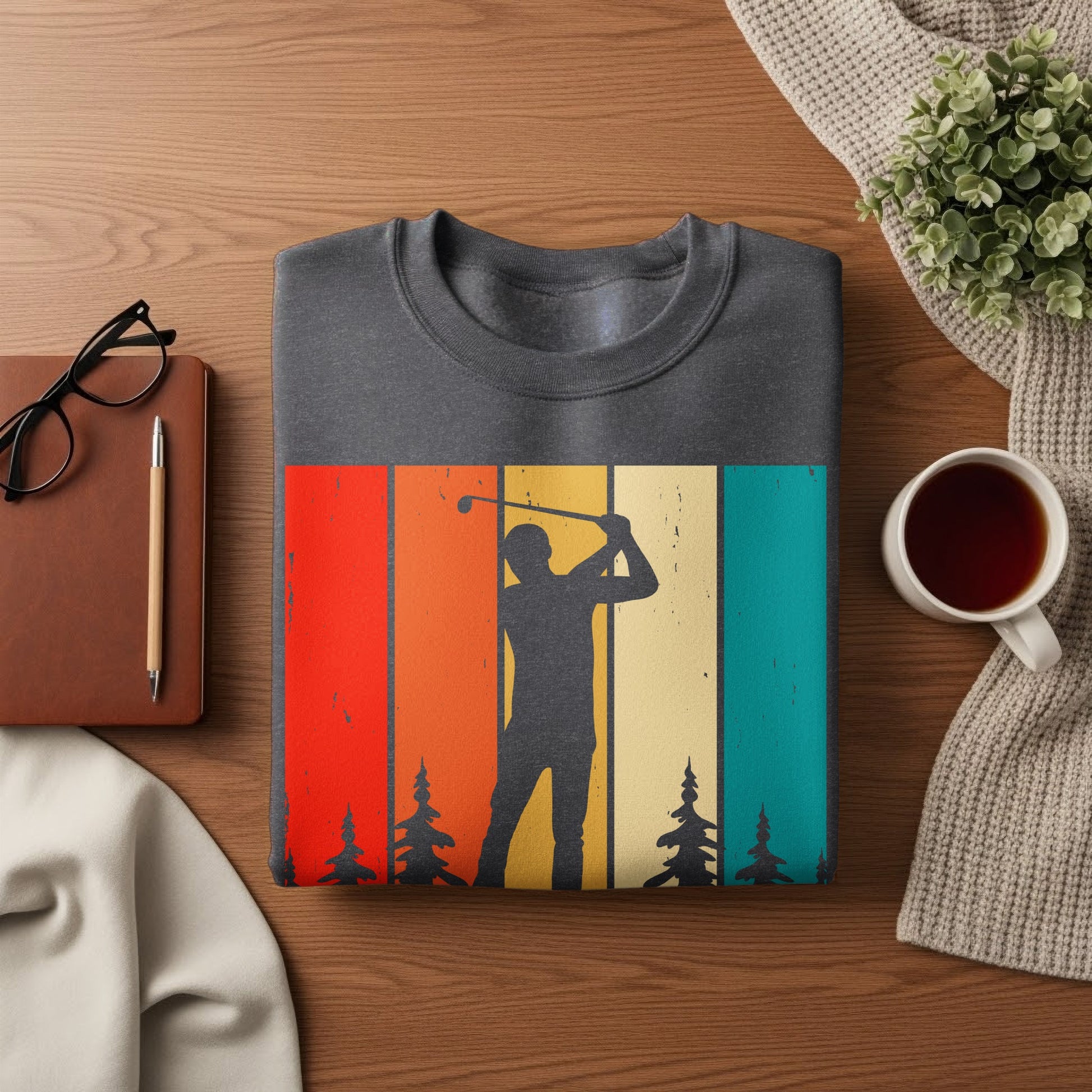 Dark gray sweatshirt with vintage sunset golf graphic and trees.