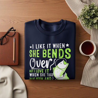 Navy sweatshirt with text "I like it when she bends over but I love it when she tugs on my worm."