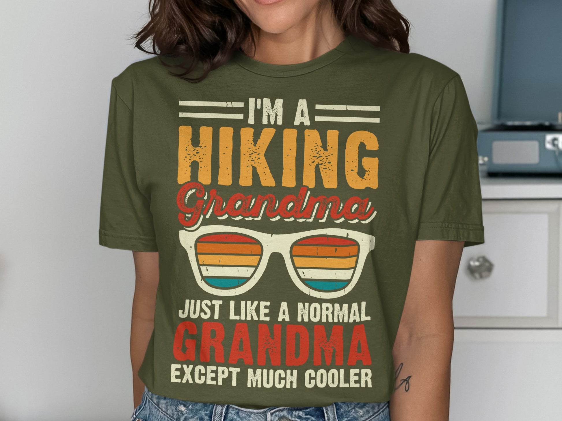 T-shirt with text "I'm a hiking grandma just like a normal grandma except much cooler."