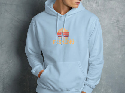 Light blue hoodie with a sunset fishing graphic and text.