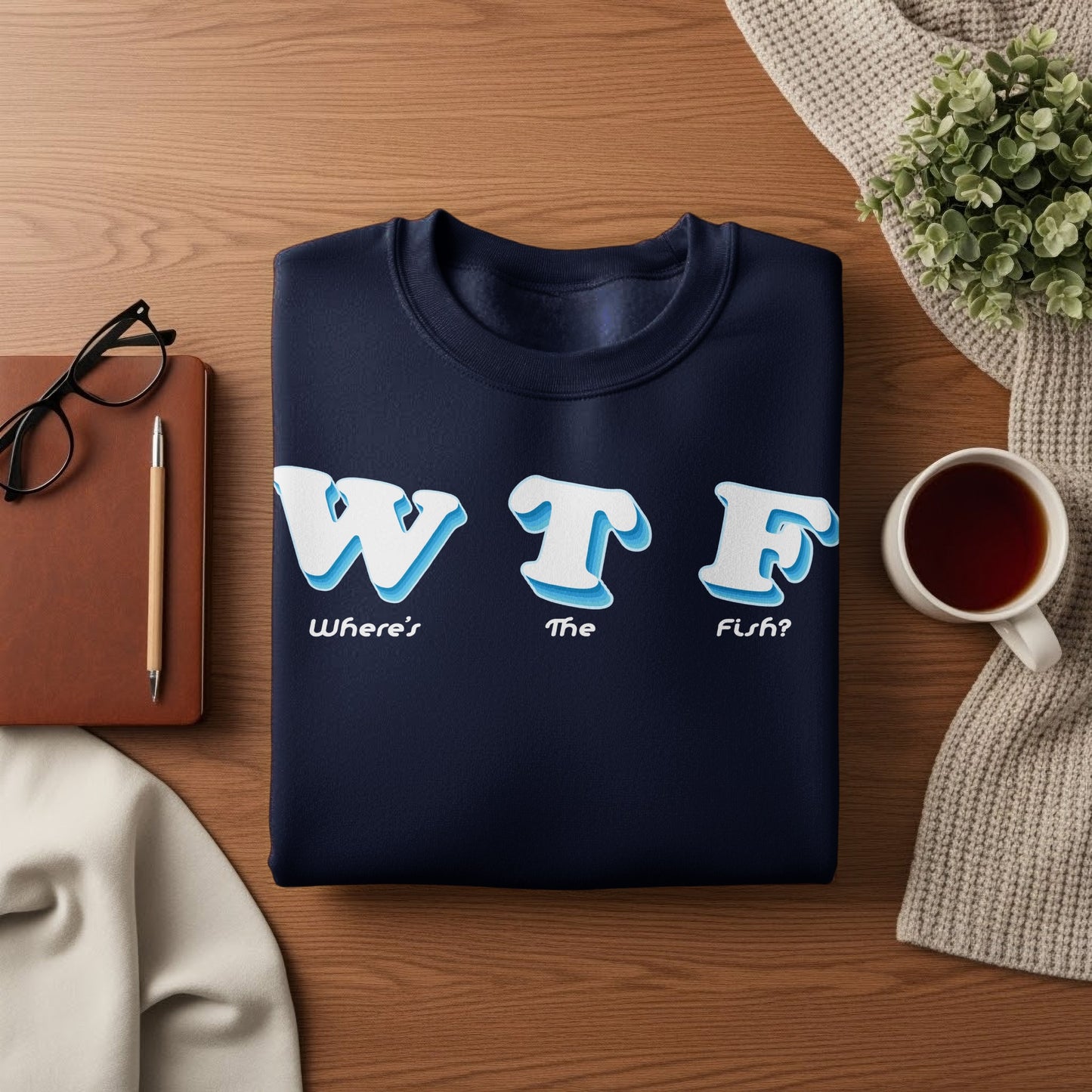 Navy sweatshirt with "WTF The Fish?" text graphic.
