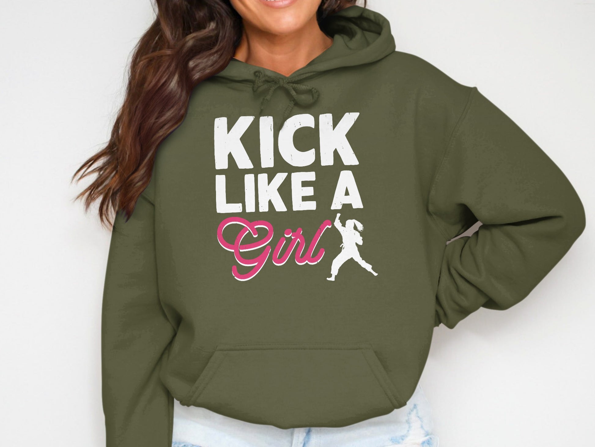 Green hoodie with "KICK LIKE A GIRL" text and silhouette of a girl kicking.