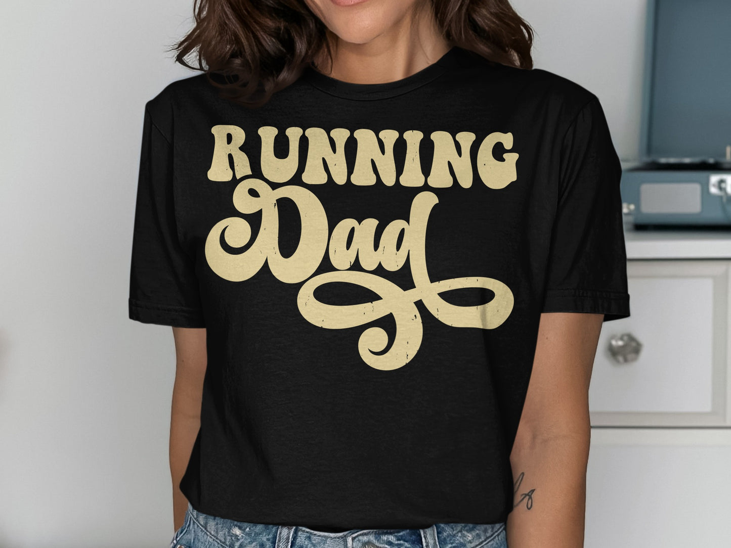 Black t-shirt with "Running Dad" in cream retro lettering.