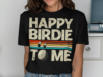 T-shirt with "Happy Birdie To Me" text, golf balls, and striped graphic.