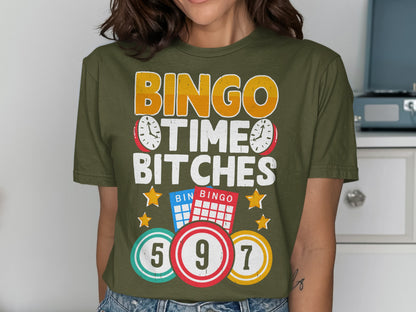 Olive green t-shirt with "BINGO TIME BITCHES" text and bingo cards.