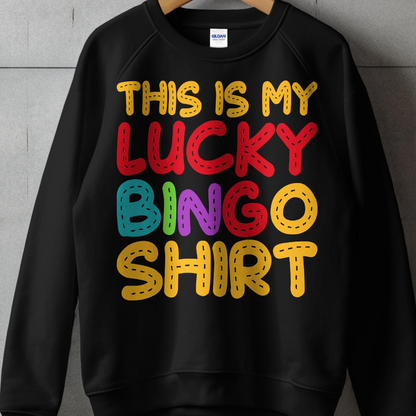 Black sweatshirt with "THIS IS MY LUCKY BINGO SHIRT" in colorful block letters.