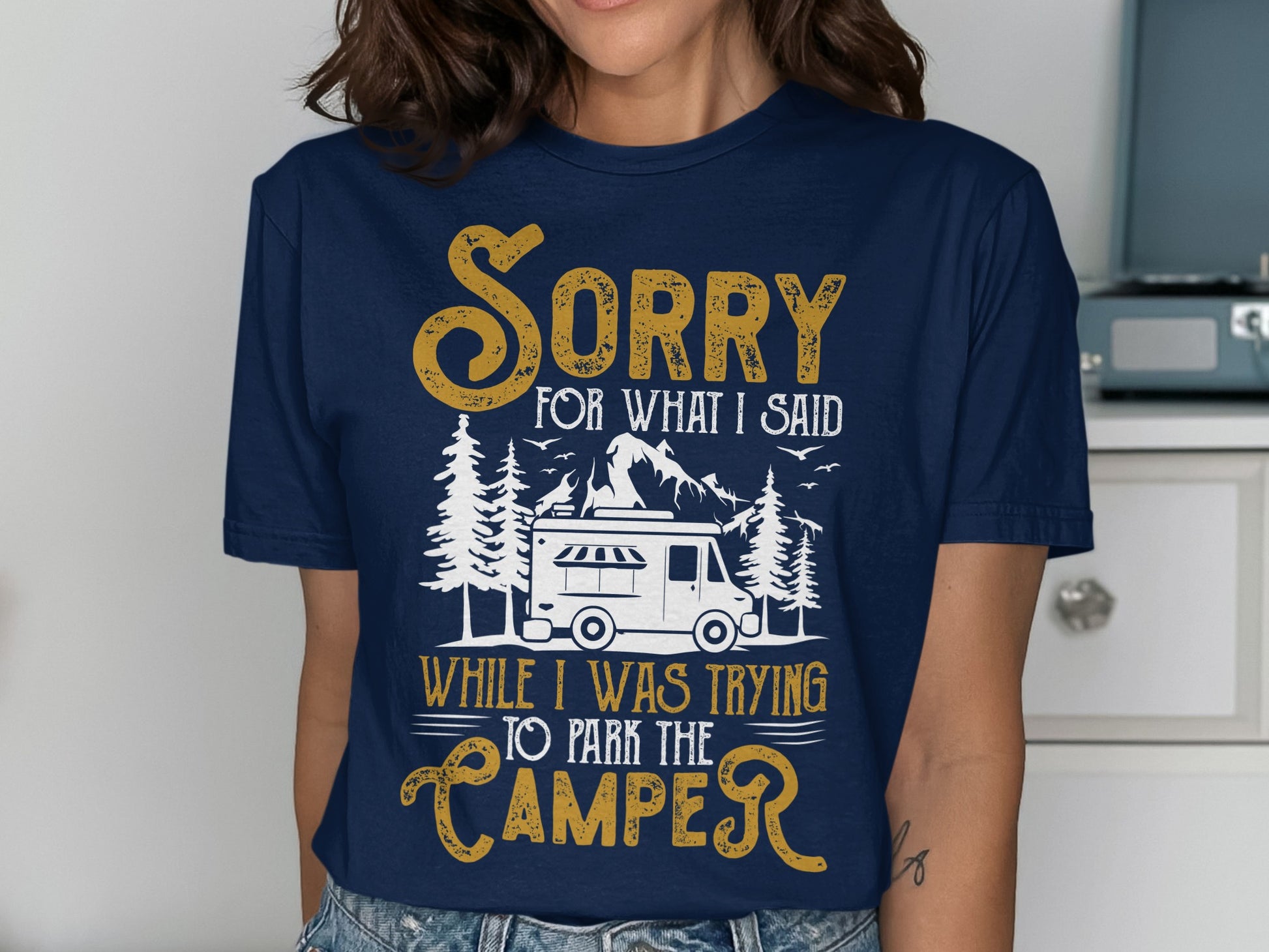 Navy t-shirt with "Sorry for what I said while trying to park the camper" text and RV graphic.