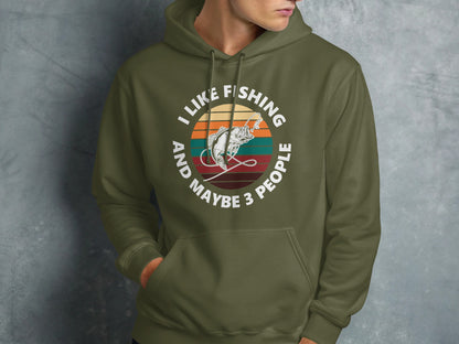Olive green hoodie with "I like fishing and maybe 3 people" text and fish graphic.