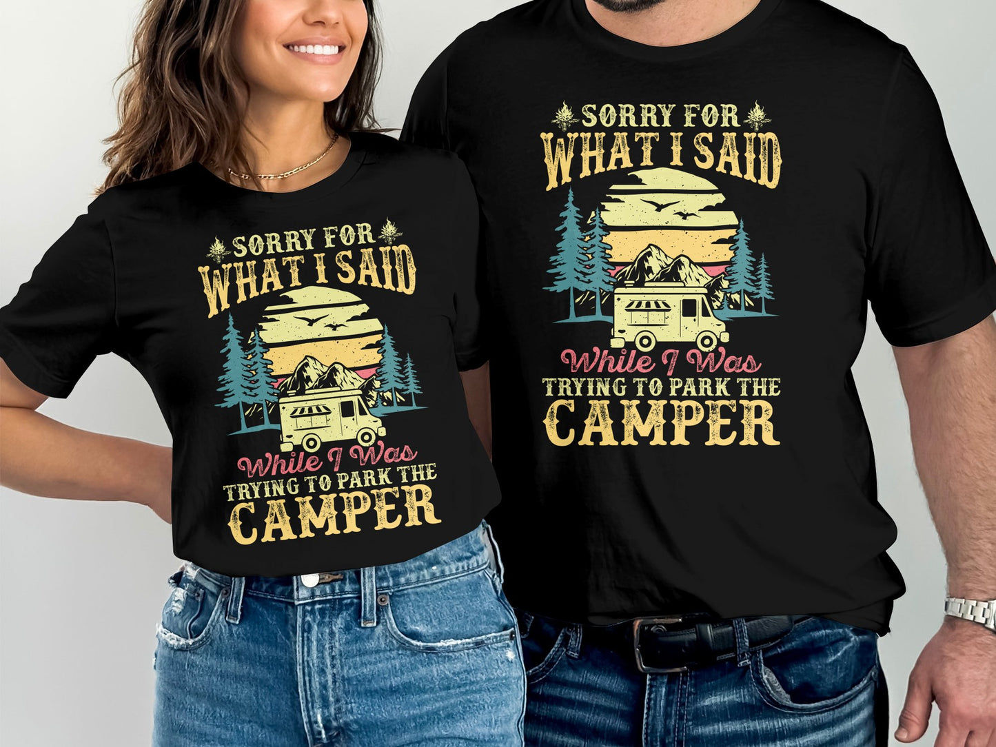 Black t-shirt with vintage camper, trees, and "Sorry for what I said while trying to park the camper" text.