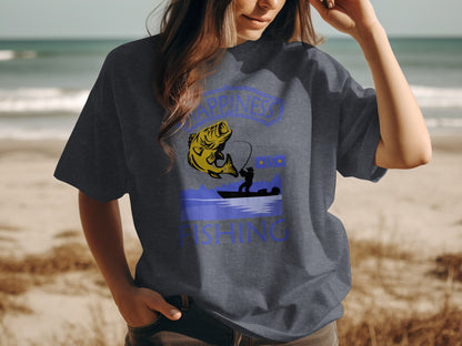 Dark t-shirt with "Happiness is Fishing" text and graphic of a person fishing.