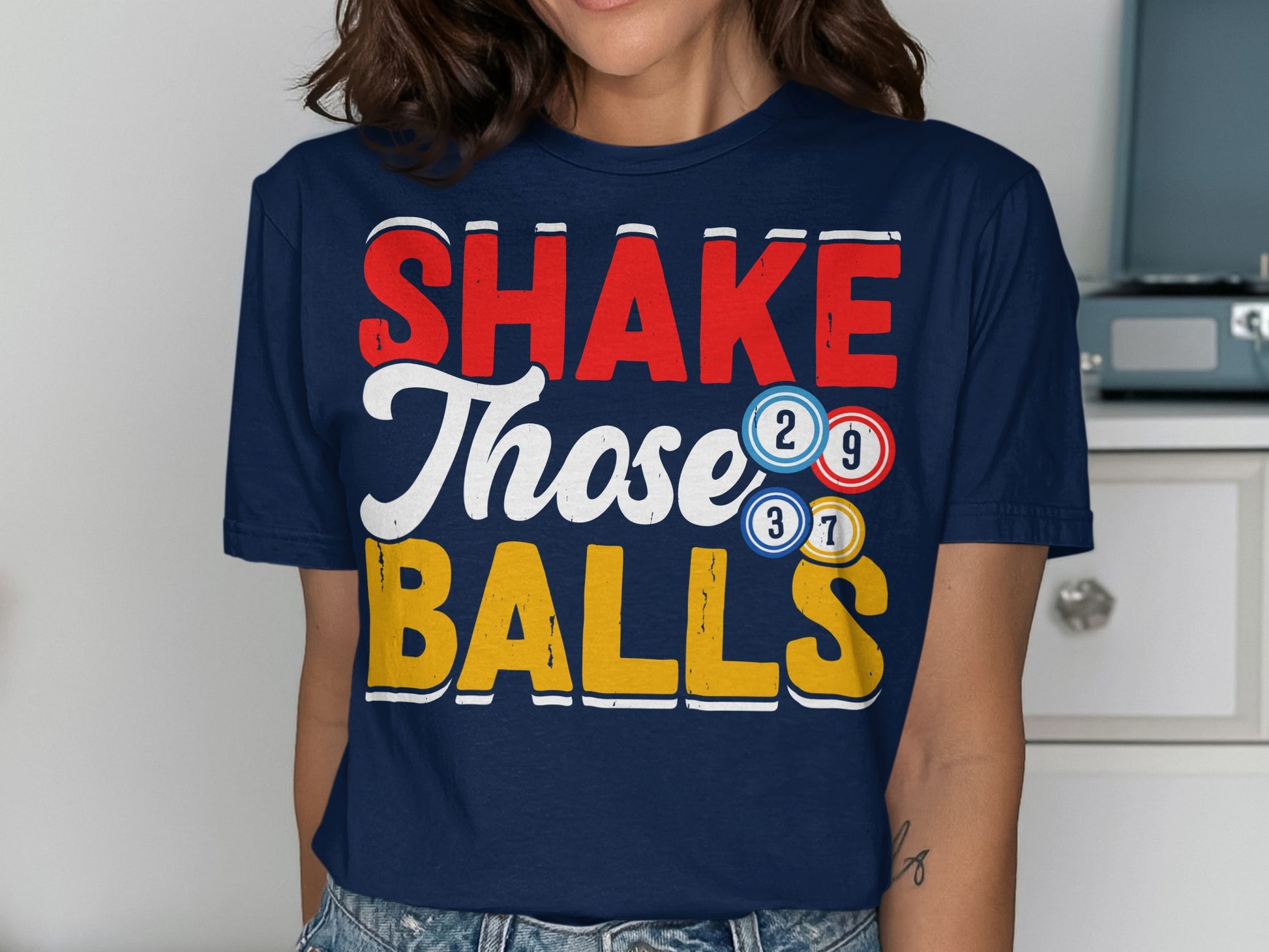 Navy t-shirt with "SHAKE Those BALLS" and bingo balls.