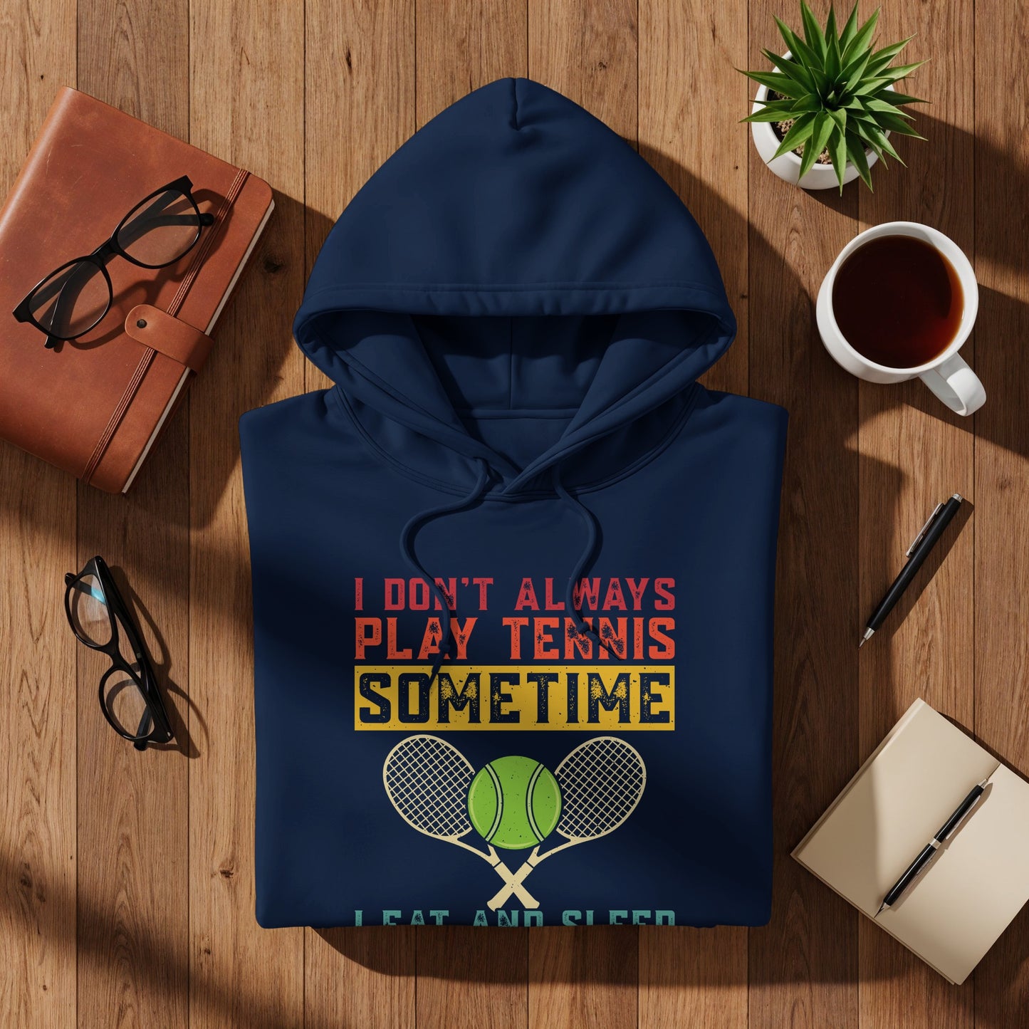 Navy hoodie with "I Don't Always Play Tennis" text and crossed rackets.