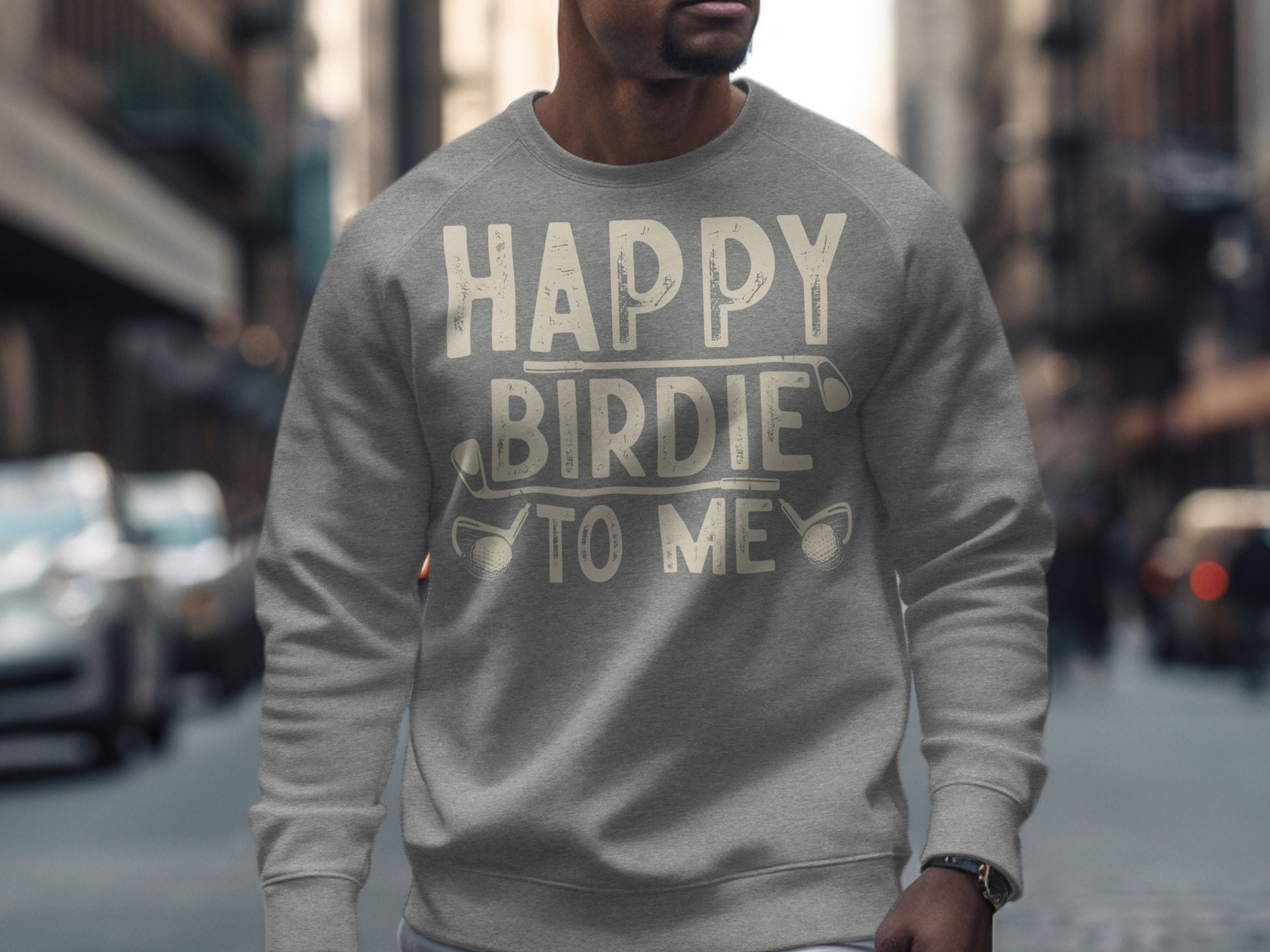 Gray sweatshirt with "Happy Birdie To Me" text and golf clubs.