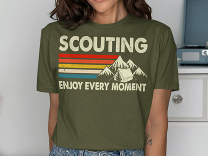 Green t-shirt with "SCOUTING ENJOY EVERY MOMENT" and mountain design.