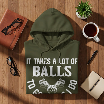 Olive green hoodie with "IT TAKES A LOT OF BALLS TO GOLF" text and golf ball graphic.