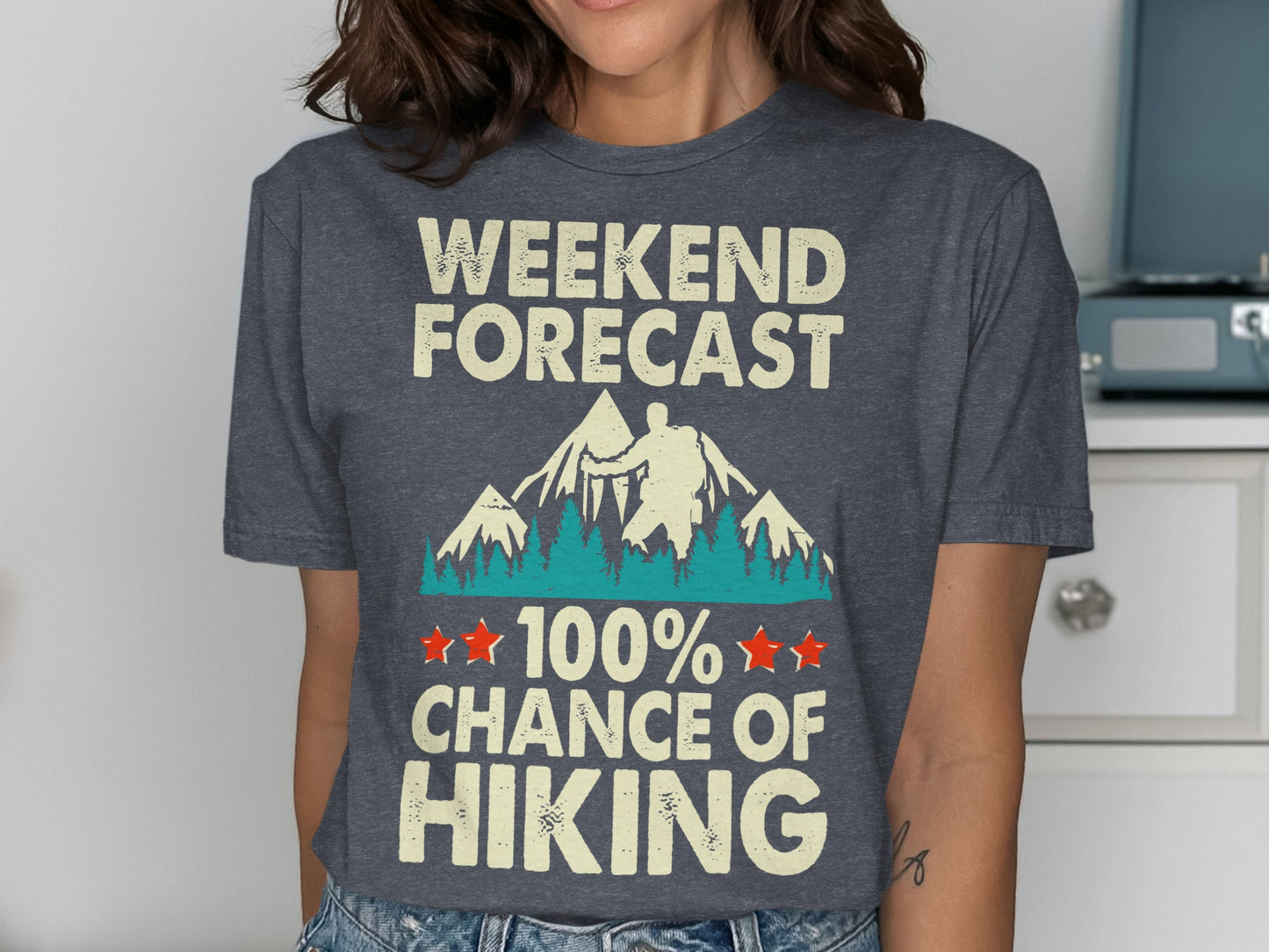 T-shirt with "Weekend Forecast 100% Chance of Hiking" graphic.