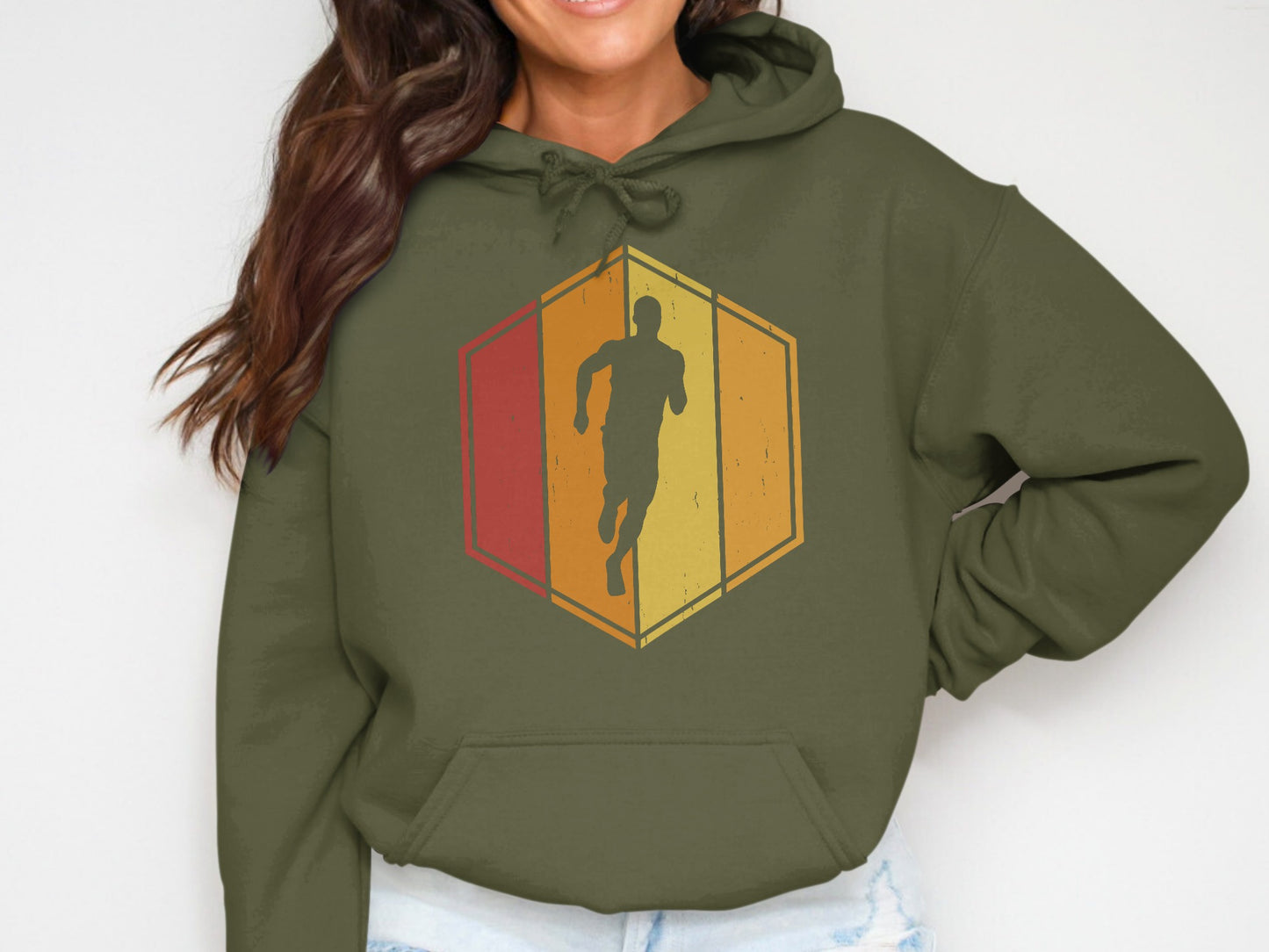 Runner silhouette within a retro-style hexagon graphic on a green hoodie.