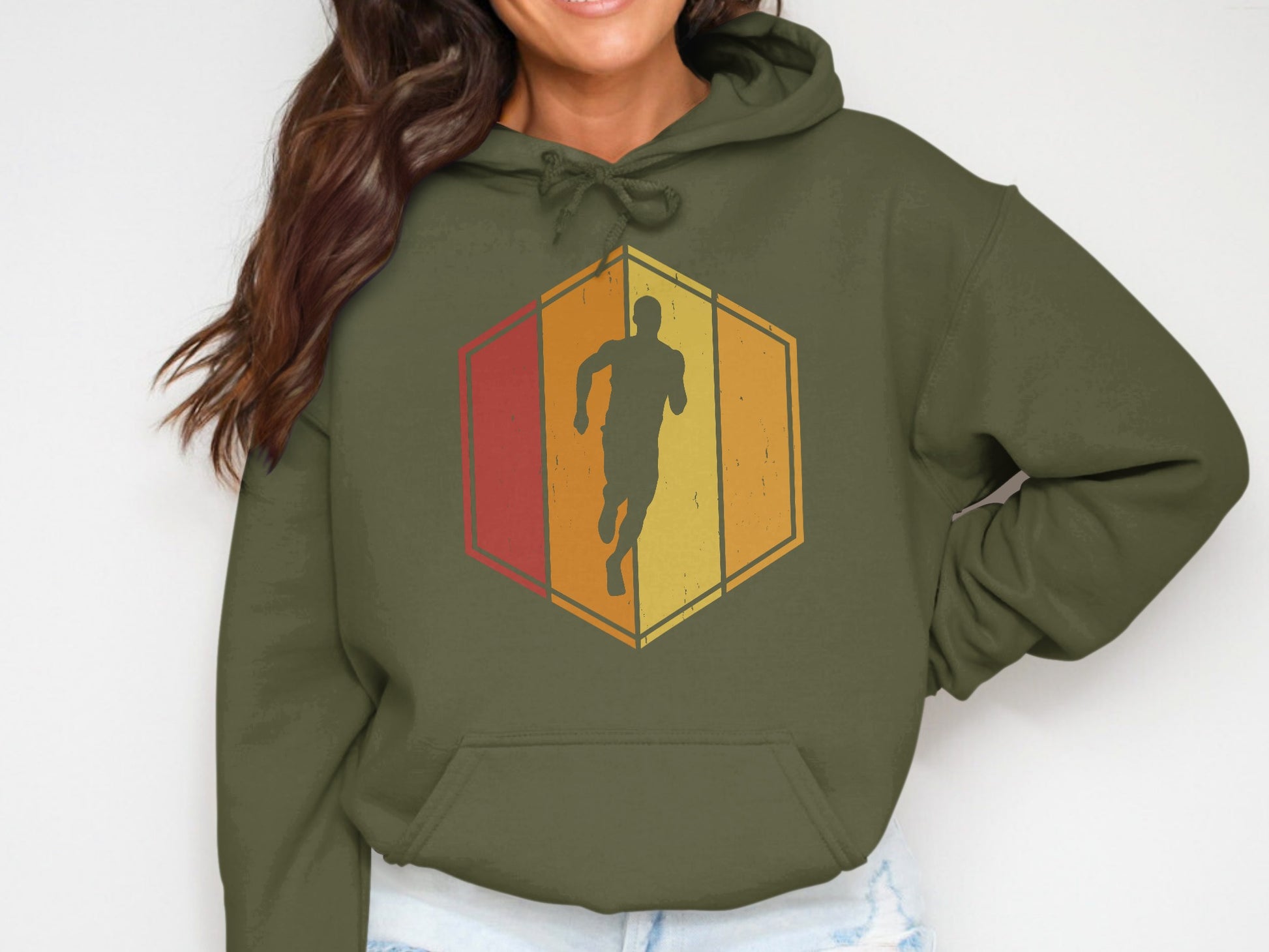 Runner silhouette within a retro-style hexagon graphic on a green hoodie.