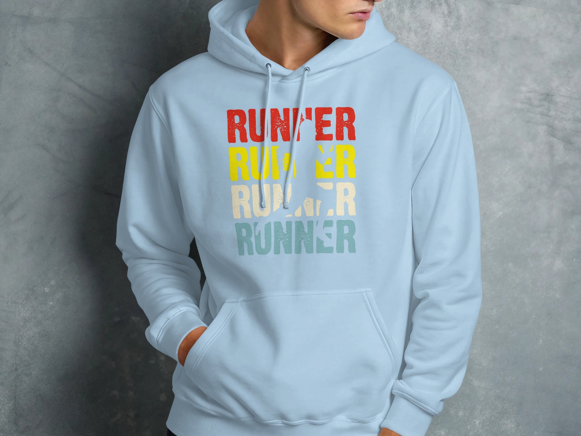 Light blue hoodie with "RUNNER" text stacked in red, yellow, and teal.