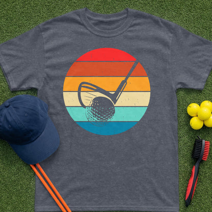 Dark t-shirt with vintage golf sunset graphic and golf accessories.