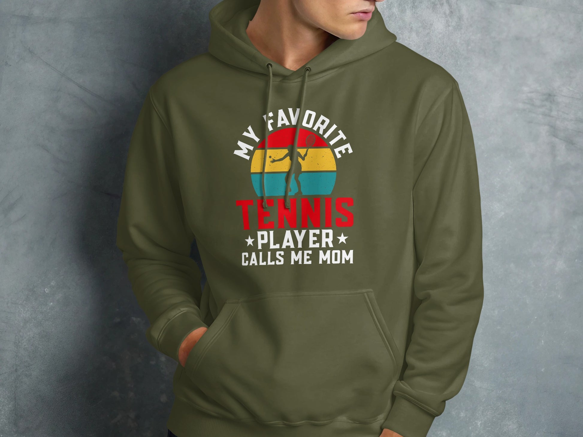 Olive green hoodie with "MY FAVORITE TENNIS PLAYER CALLS ME MOM" text.