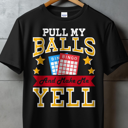 Black t-shirt with "PULL MY BALLS AND MAKE ME YELL" text and bingo cards.