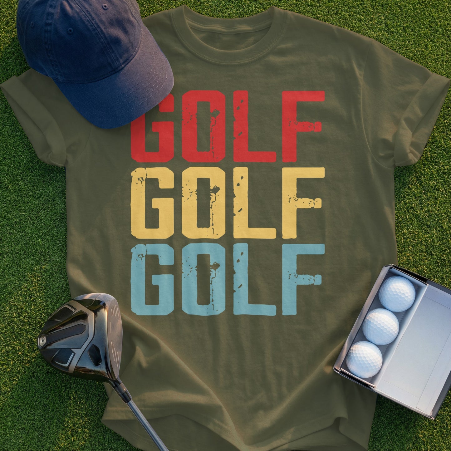 Olive green t-shirt with "GOLF GOLF GOLF" in red, yellow, and blue text.