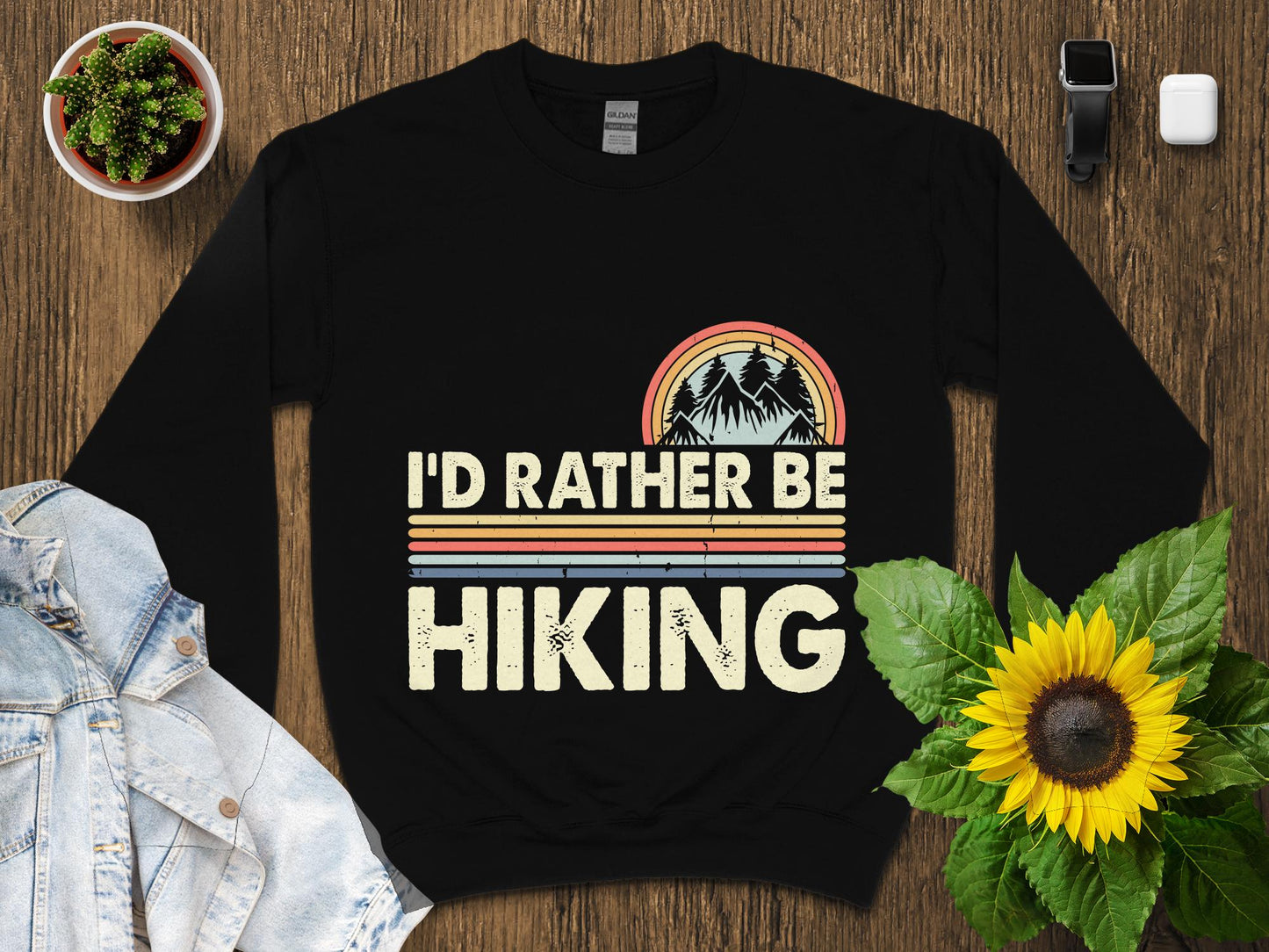 Black sweatshirt with "I'd Rather Be Hiking" text and mountain graphic.