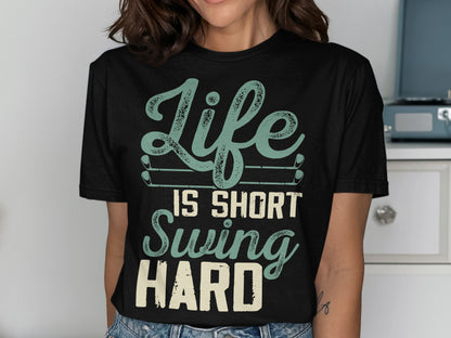 Black t-shirt with "Life Is Short Swing Hard" text and golf clubs.