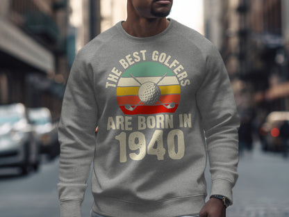 Gray sweatshirt with "The Best Golfers Are Born In 1940" text and golf imagery.
