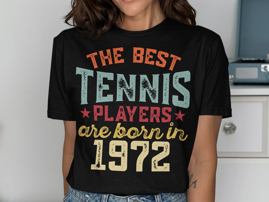 Black t-shirt with "The Best Tennis Players are Born in 1972" text.