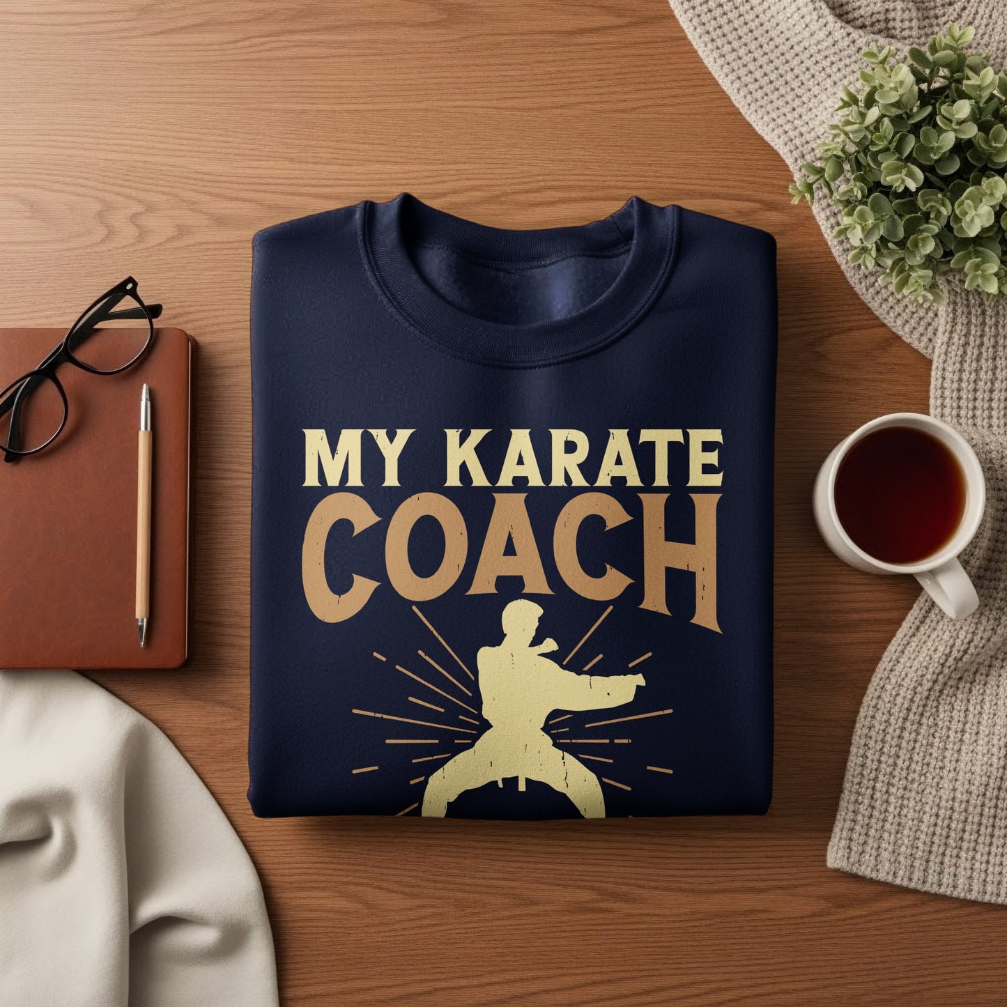 Navy sweatshirt with "MY KARATE COACH" text and karate fighter graphic.