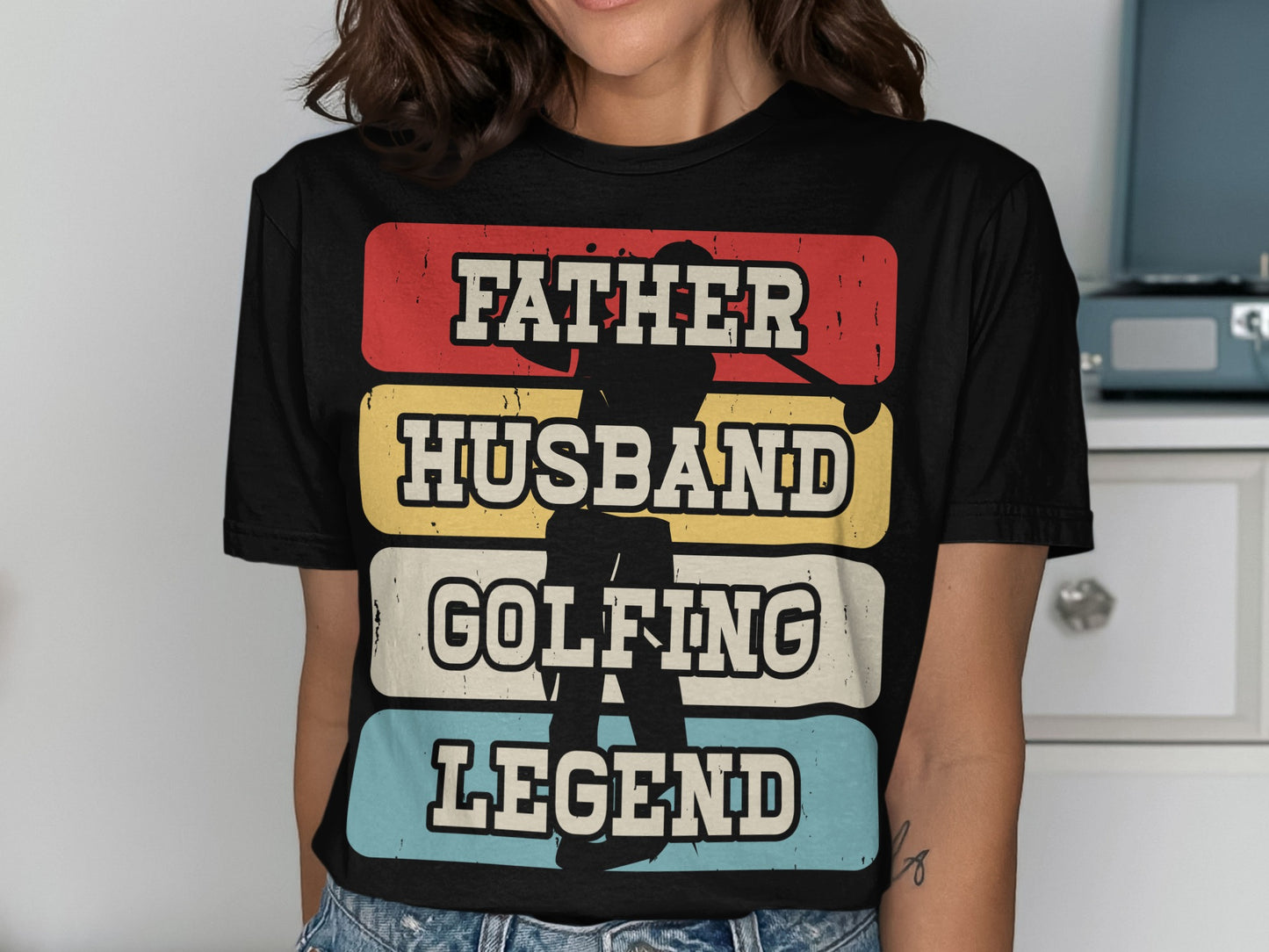 Black t-shirt with "Father Husband Golfing Legend" text and golfer silhouette.
