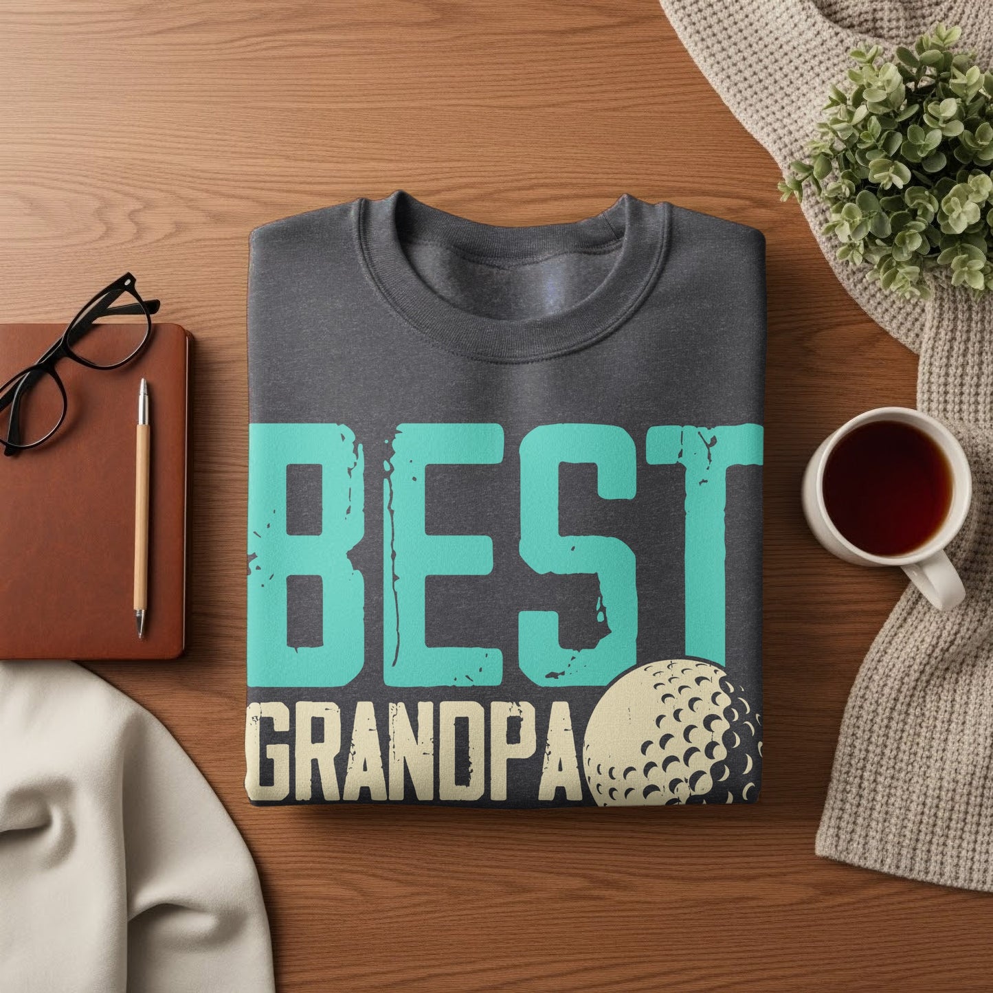 Dark grey sweatshirt with "BEST GRANDPA" and golf ball graphic.