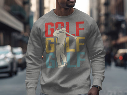 Grey sweatshirt with "GOLF" text and golfer graphic.