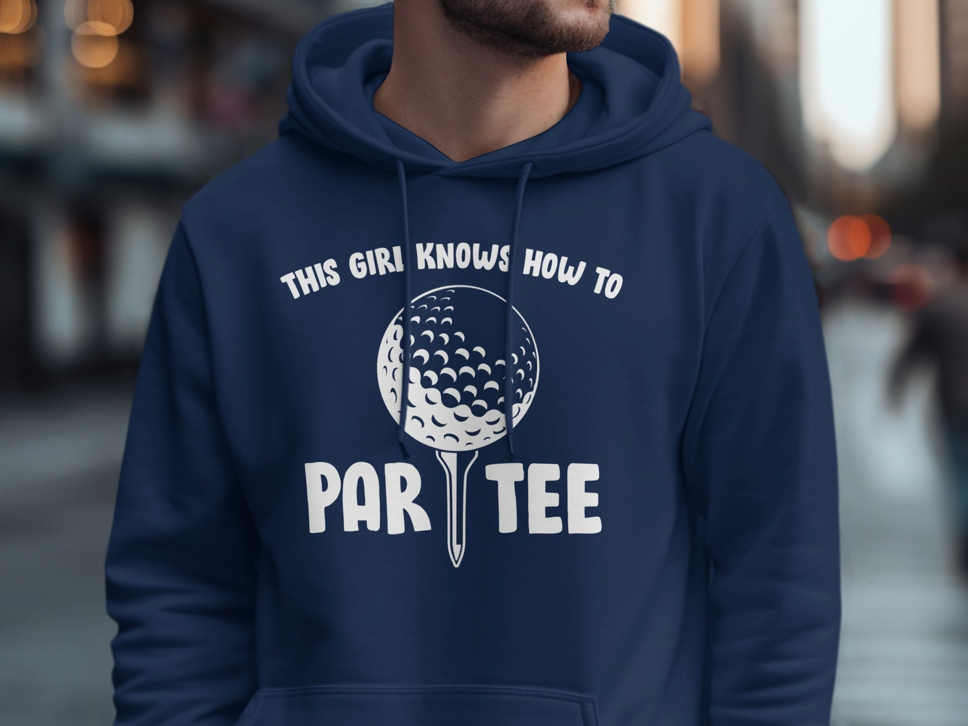 Navy hoodie with "THIS GIRL KNOWS HOW TO PAR TEE" and golf ball graphic.