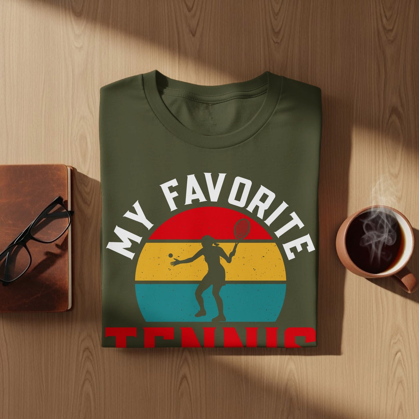 Olive t-shirt with "My Favorite Tennis" text and tennis player graphic.